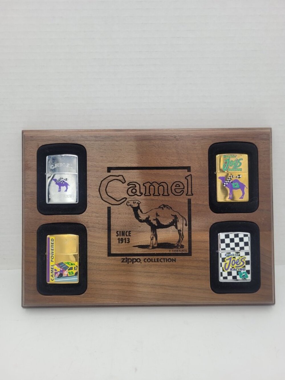 Zippo CAMEL Racing Collection 4-Piece Lighter Set with Wooden Display Board